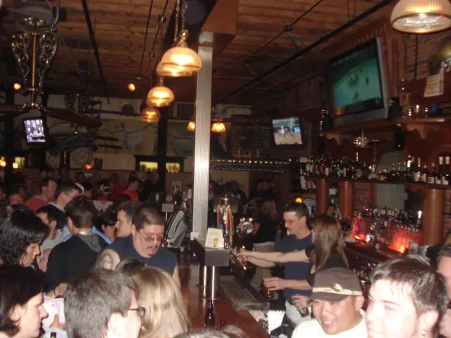 Here in this picture we can see number of people standing over a place and in the middle we can see...